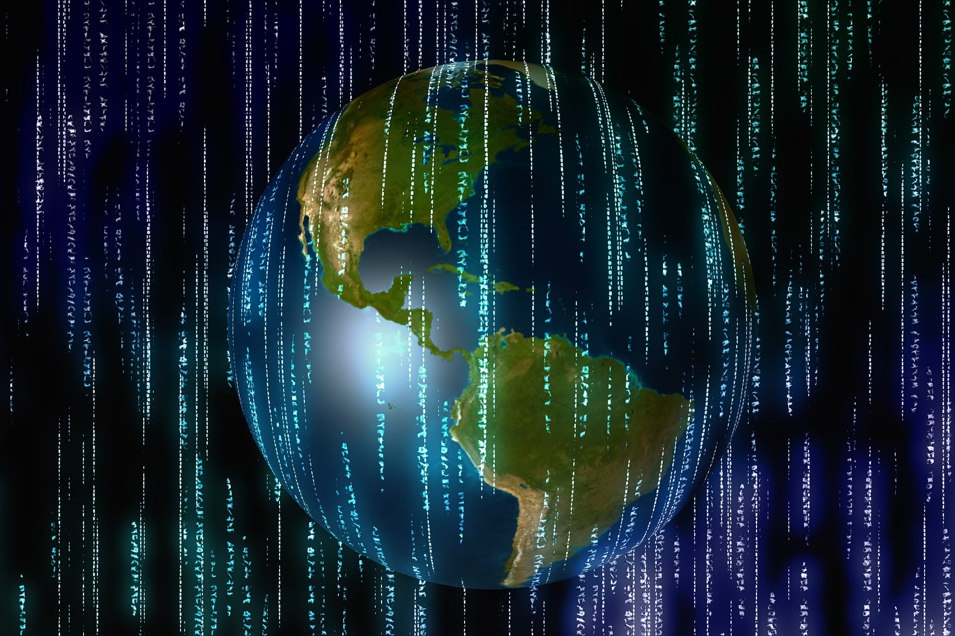Globe encircled by computing code
